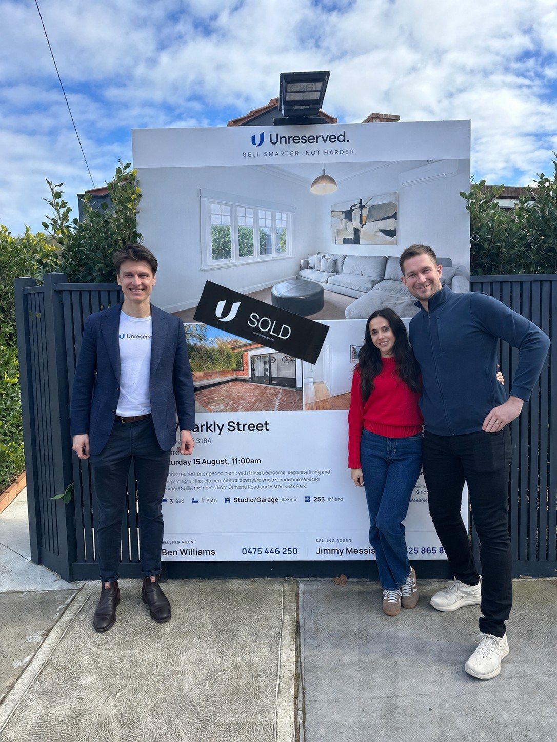 Ben Williams with the owners of 377 Barkly Street