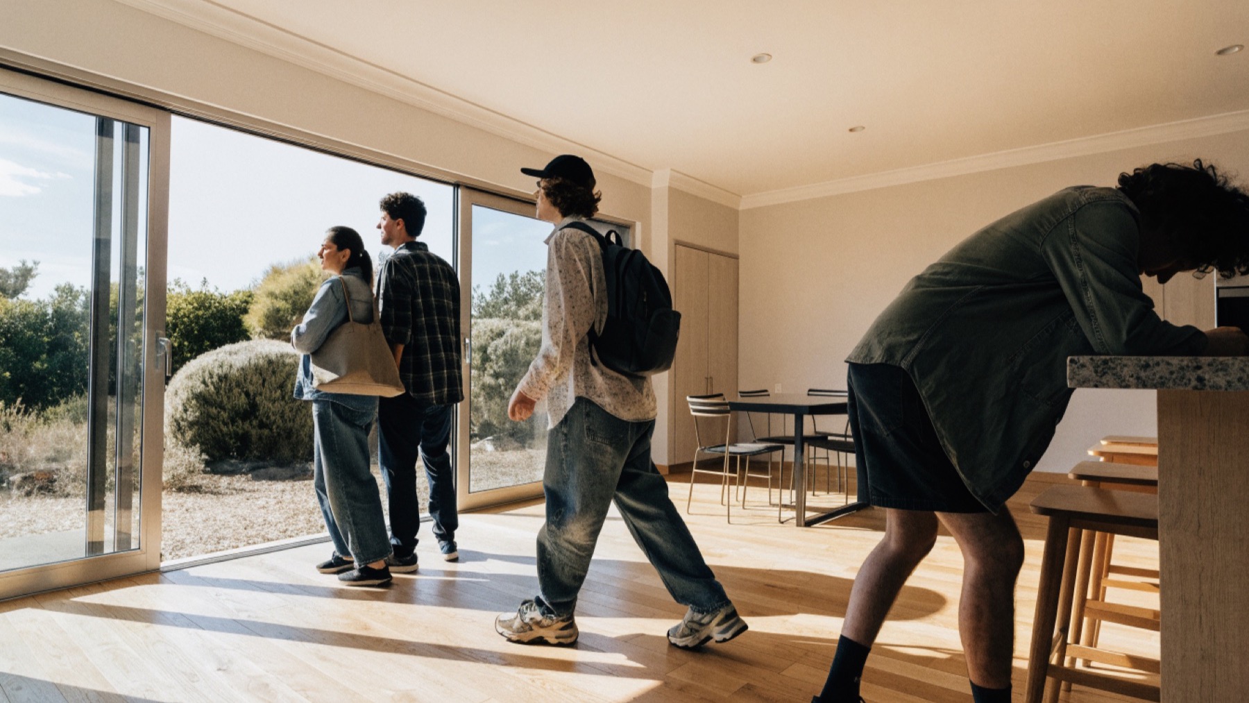 Buyers walking through an open home inspection at an Australian house