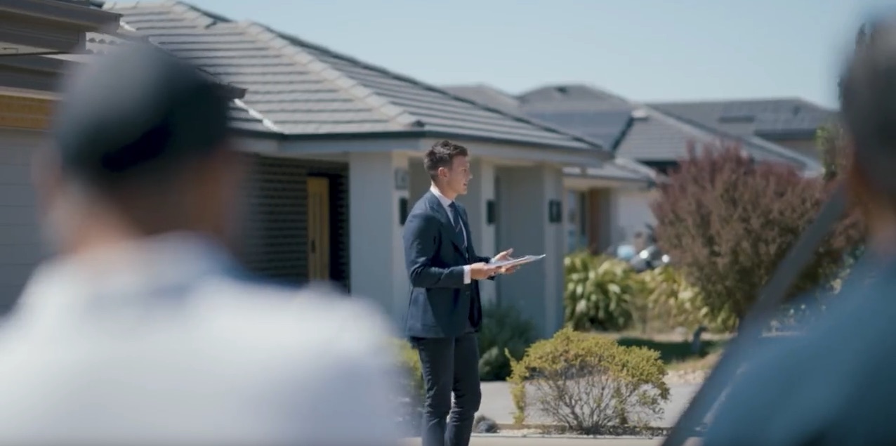An Unreserved agent running an open home